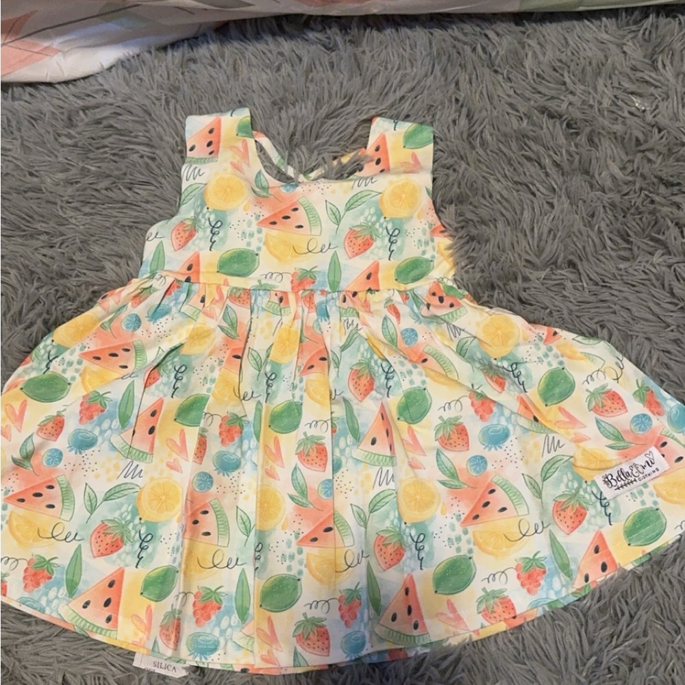 New in bag Bella and Omi top